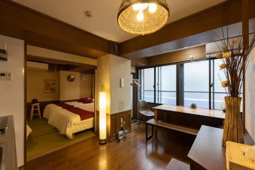 Higashishinsaibashi Apartment | 米2 心斎橋エリアど真ん中 2ldkのお部屋 ビルの2階になります EVはありません