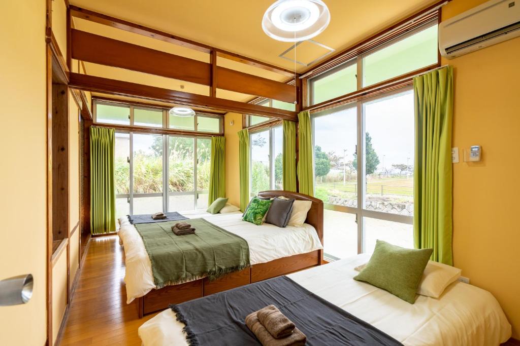 Kadena-cho House | Deluxe Room 130平米 URUMAHOTEL