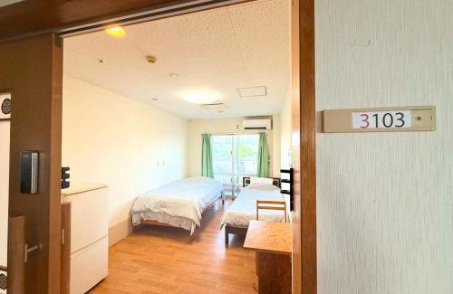 Kin Hostel | ハイ沖縄金武店トイレお風呂共用 プレオープン中駐車場有 ペット同伴可能長期滞在可能2025年10月より車貸し出しサービス有希望であればお申し付けください