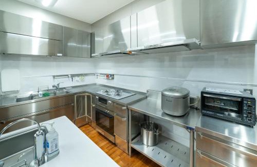 Awase Apartment | 最大20名宿泊可能 大型テレビでスポーツ観戦 グループ旅行に最適 KOEI HOUSE in AWASE