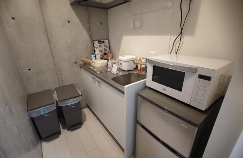 Higashinippori Apartment | 101Room,7-minute walk from Uguisudani Station located on the 1nd floor of an apartment-style building Twin room No elevator