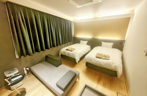 Hatsukaichi Hotel | 7 minutes walk to Miyajimaguchi ferry terminal Free parking available Leave your car at the hotel /Hatsukaichi Hiroshima