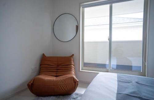Ozu Apartment | Modern 4BR Stay in Ozu Hachikubo for 11 Guests by Restavio