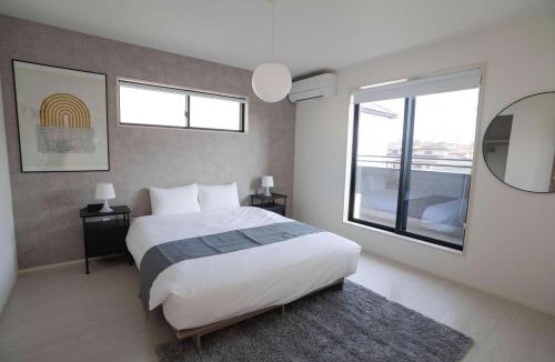 Ozu Apartment | Modern Home Near Kumamoto Airport by Restavio