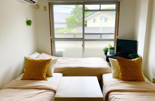 Toyonaka Apartment | Sakura202 伊丹空港アクセス抜群ペット宿泊可能 最寄駅から徒歩10分以内 都心からのアクセス抜群タイニールーム最大3名宿泊可能