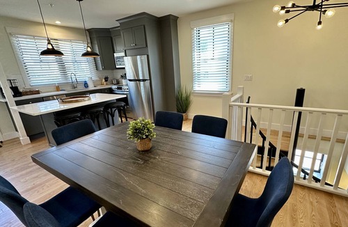 Yachting Village Hotel | Stunning downtown Newport RI vibes in this stunning renovated 2BR apartment off Historic Thames Street! 2 queen beds + pull-out sofa (sleeps 6), full stocked kitchen, private deck entry, AC, 2 TVs, off-street parking. Steps to dining, wharfs. Enjoy!
