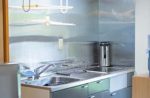 Iida House | The Snowfront Apartment Nabe Sun -HAKUBA GORYU-