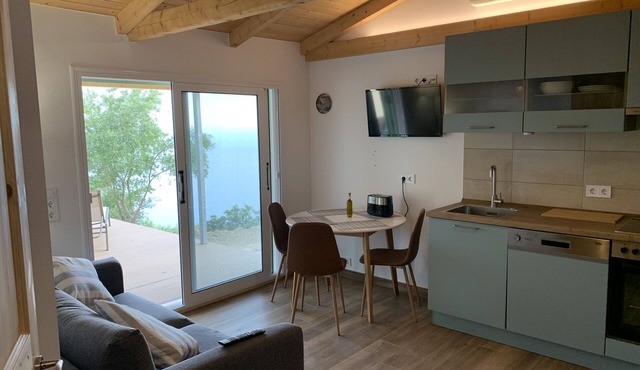 Former studio with a gigantic view of the sea - almost energy self-sufficient! in Vrachos