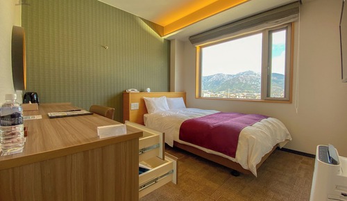 Semi-double room (top floor)