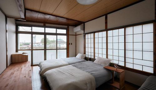 Twin Room with Shared Bathroom