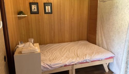 Single Bed in Dormitory Room