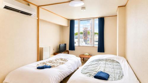 Twin Room with Shared Bathroom