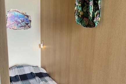 Single Bed in Dormitory Room
