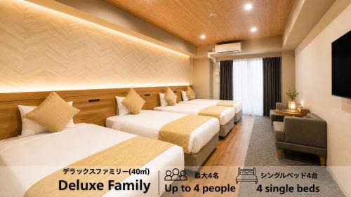 Deluxe Quadruple Room with Balcony