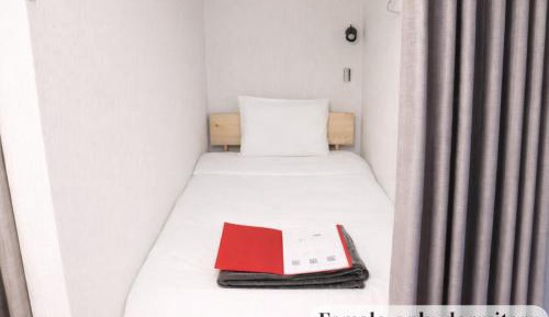Single Bed in Female Dormitory Room