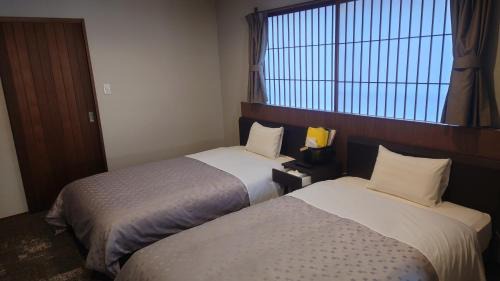 Twin Room with Shared Bathroom