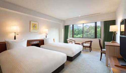 Classic Deluxe Suite with Four Single Beds and Mountain View