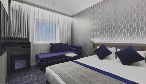 Double Room (20sqm) with Shower Booth and Sofa Bed for 3 People - Non-Smoking