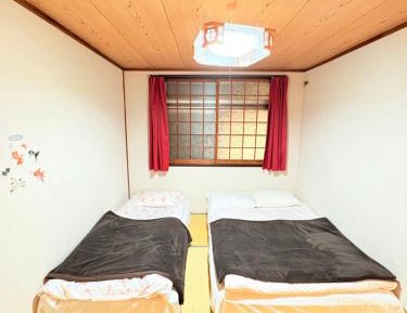 Quadruple Room with Private Bathroom