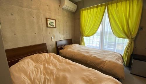 Twin Room with Private Bathroom