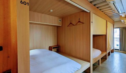 Single Bed in Dormitory Room