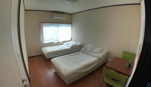 Standard Twin Room with Shared Bathroom